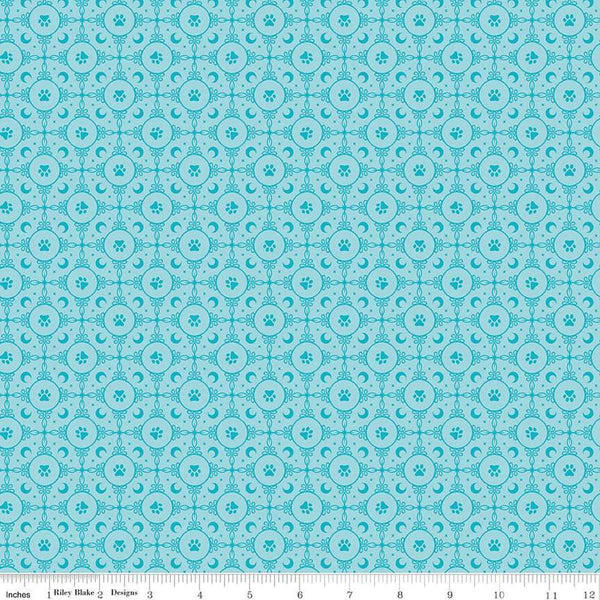 Image of Celtic Cats Circle Paws Aqua quilting cotton fabric by Brigid Ashwood for Riley Blake Designs. Features pawprints on a blue background. Cute Little Fabric Shop