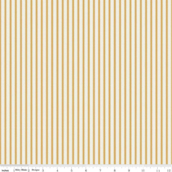 Image of Ivy Reese Ticking Golden quilting cotton fabric by Deena Rutter for Riley Blake Designs. Features stripes on a yellow background. Cute Little Fabric Shop