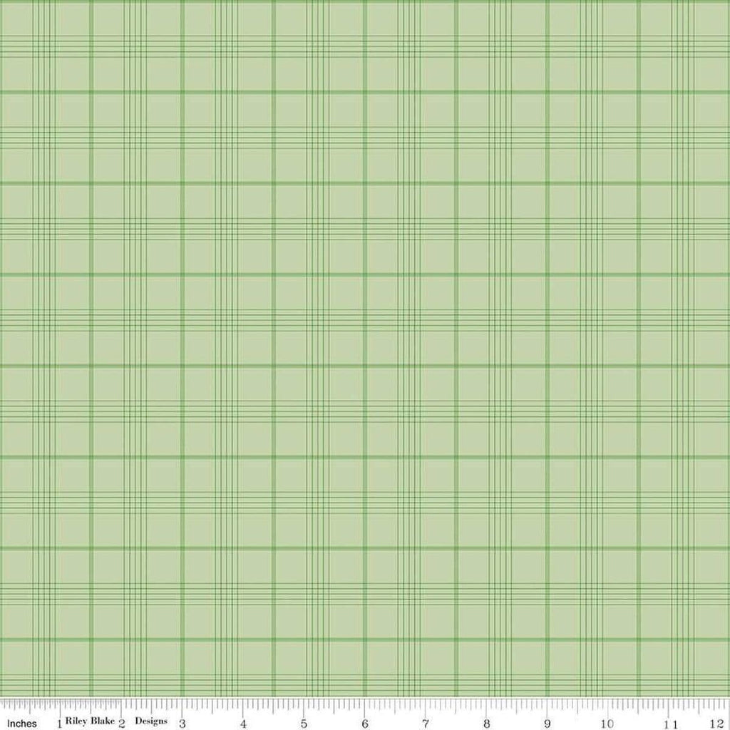 Image of Flannel Peter Rabbit™ & Friends Plaid Fern flannel cotton fabric by Riley Blake Official Licensed Product for Riley Blake Designs. Features checks on a green background. Cute Little Fabric Shop