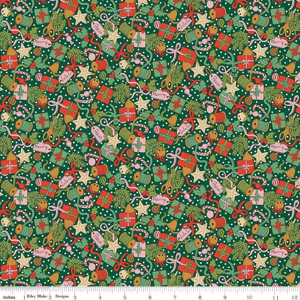 Image of Festive Greetings Festive Gifting quilting cotton fabric by Liberty Fabrics for Riley Blake Designs. Features presents on a green background. Cute Little Fabric Shop