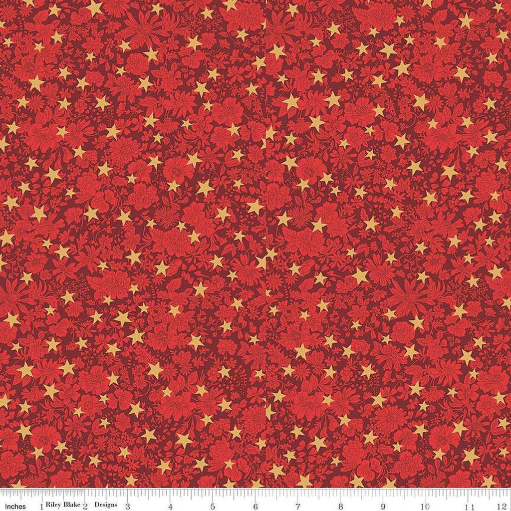 Image of Festive Greetings Emily Star quilting cotton fabric by Liberty Fabrics for Riley Blake Designs. Features stars on a red background. Cute Little Fabric Shop
