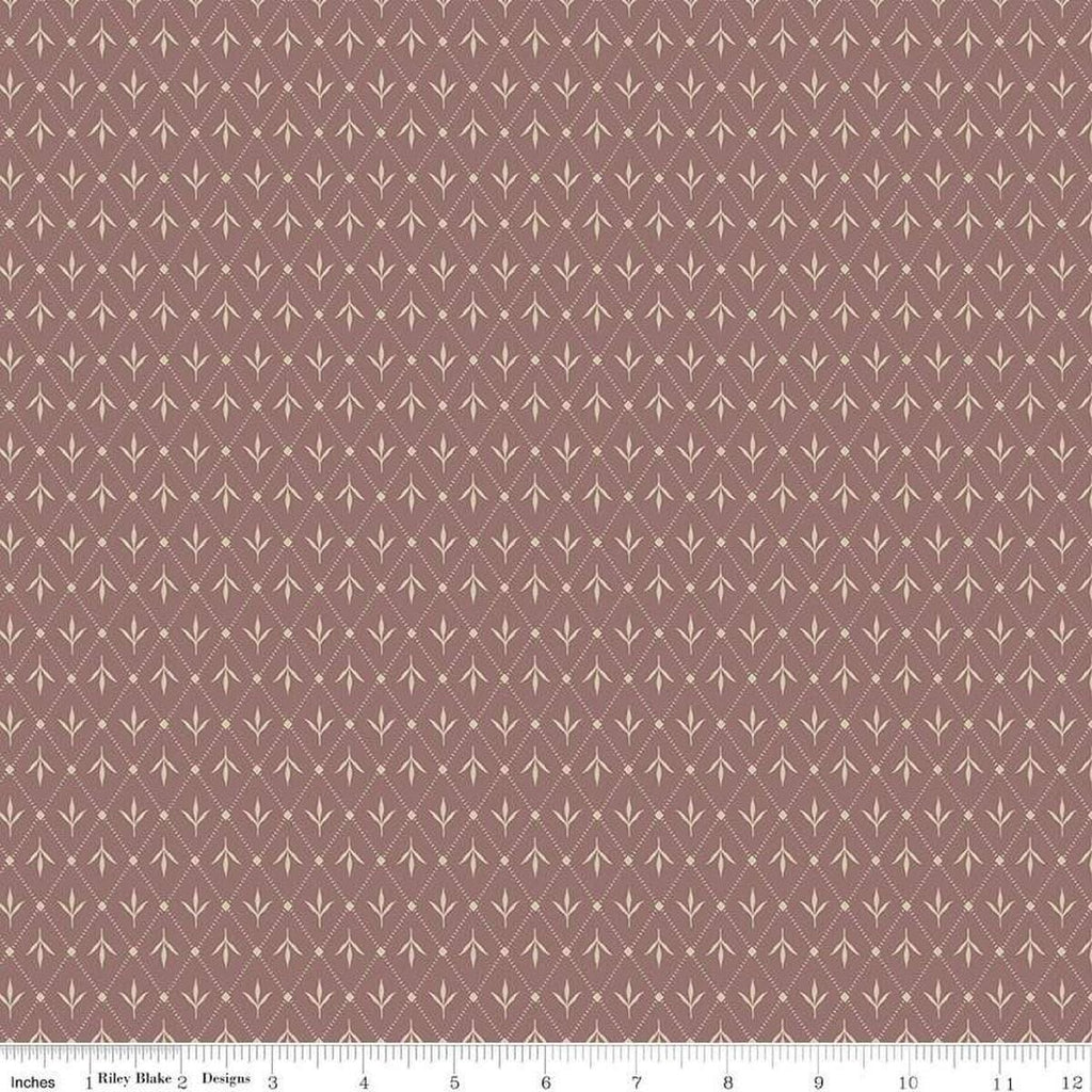 Image of Threads of Grace Ivy Marsala quilting cotton fabric by Kassidy Grace for Riley Blake Designs. Features leaves on a maroon background. Cute Little Fabric Shop