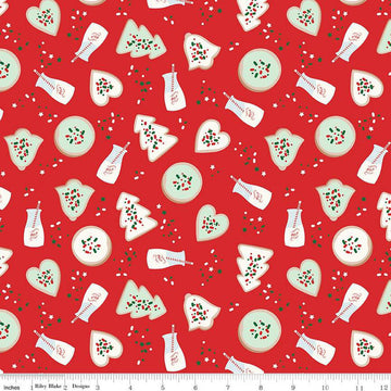 Red fabric with circle, heart, bell, and tree shaped cookies, cups of milk with straws, and sprinkles.
Cute Little Fabric Shop
