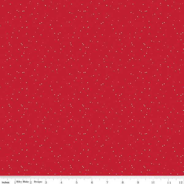 Red quilting cotton fabric with small white speckled dots. 
Cute Little Fabric Shop