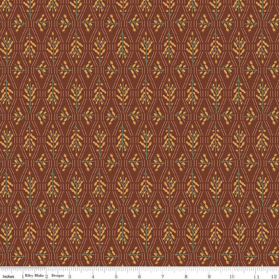 Dark reddish brown colored fabric with geometric flowers and lines in green and yellow. 
Cute Little Fabric Shop