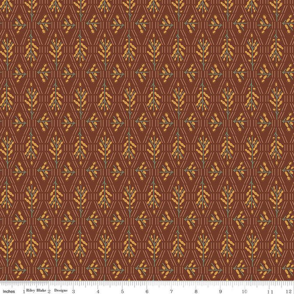 Dark reddish brown colored fabric with geometric flowers and lines in green and yellow. 
Cute Little Fabric Shop