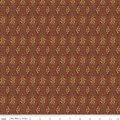 Dark reddish brown colored fabric with geometric flowers and lines in green and yellow. 
Cute Little Fabric Shop