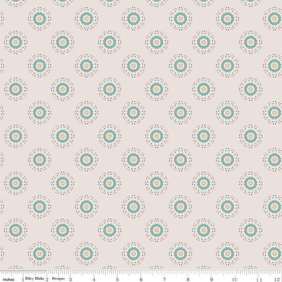 Linen, cream, sand colored quilting cotton fabrics with circular floral teal and yellow wreaths. 
Cute Little Fabric Shop