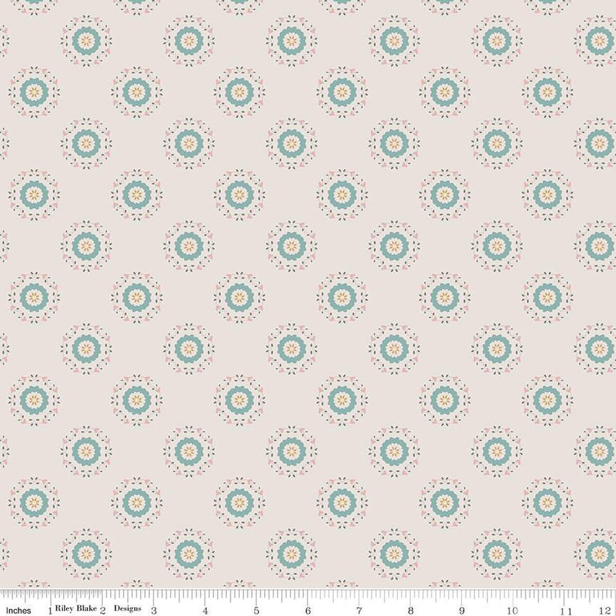 Linen, cream, sand colored quilting cotton fabrics with circular floral teal and yellow wreaths. 
Cute Little Fabric Shop