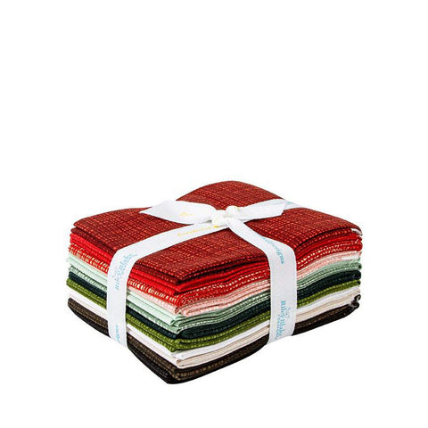 Picture of Riley Blake Design&#39;s Christmas Fat Quarter Bundle. It includes reds, greens, and neutrals tied by a ribbon. 
Cute Little Fabric Shop