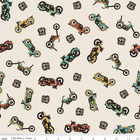 Tan, cream colored quilting cotton fabric with yellow, orange, teal, and green colored motorcycles, with Route 66 signs. 
Cute Little Fabric Shop