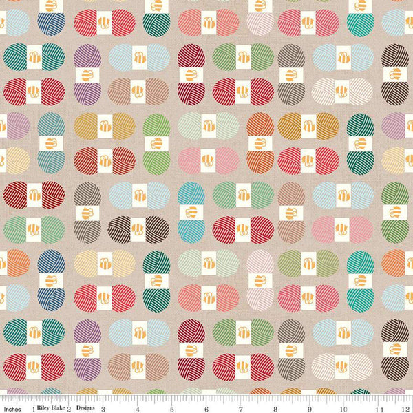 Image of Riley Blake Design&#39;s chunky thread fabric. Features graphic images of skeins of chunky thread on a tan background. 
Cute Little Fabric Shop