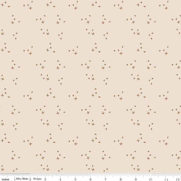 Image of cream, ivory colored Riley Blake quilting cotton fabric from the Pumpkin Spice collection. Scattered sparkles on an ivory background. 
Cute Little Fabric Shop