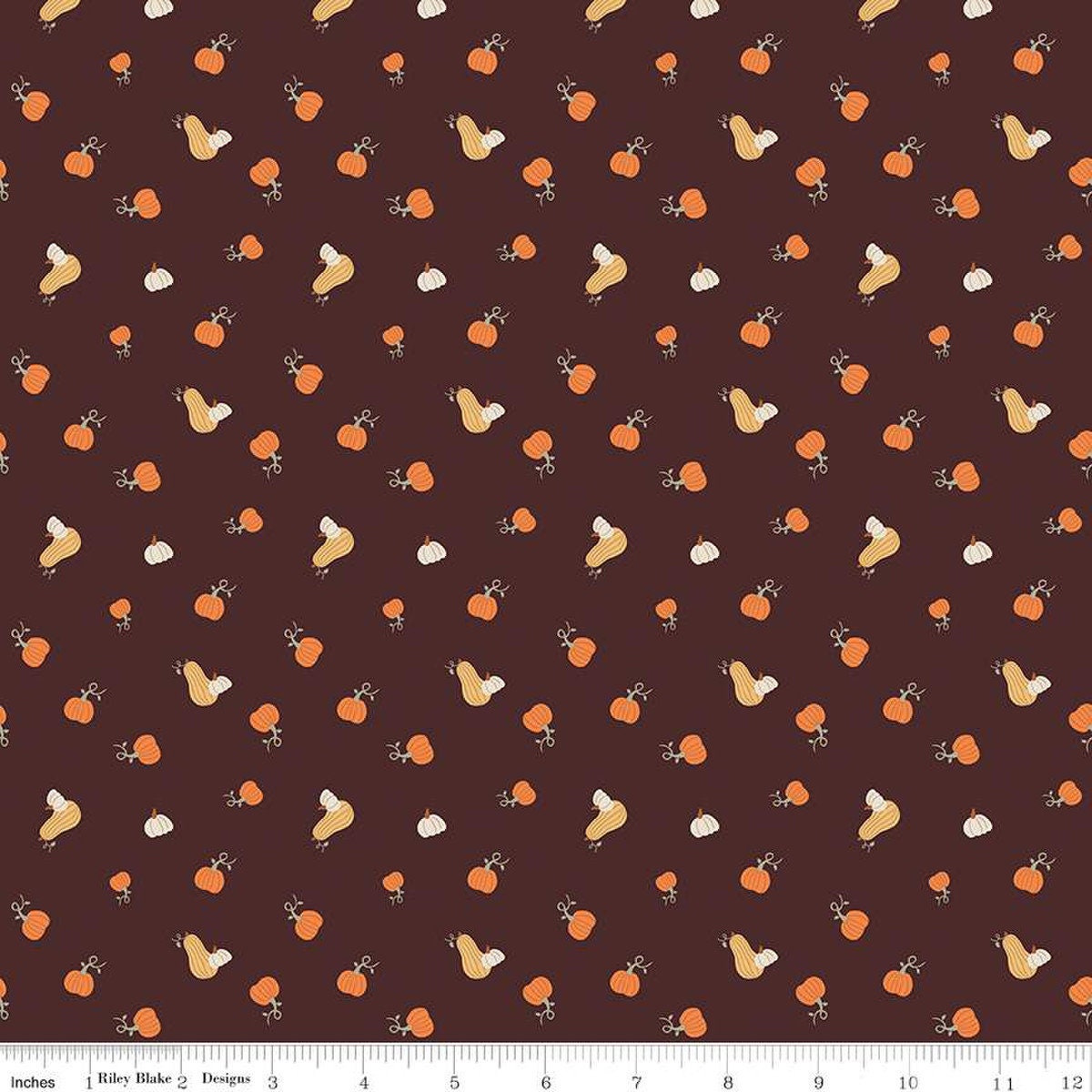 Image of espresso brown colored quilting cotton fabric for the Pumpkin Spice collection by Riley Blake Designs. Features scattered and tossed orange, yellow, and cream pumpkins on the espresso background. 
Cute Little Fabric Shop