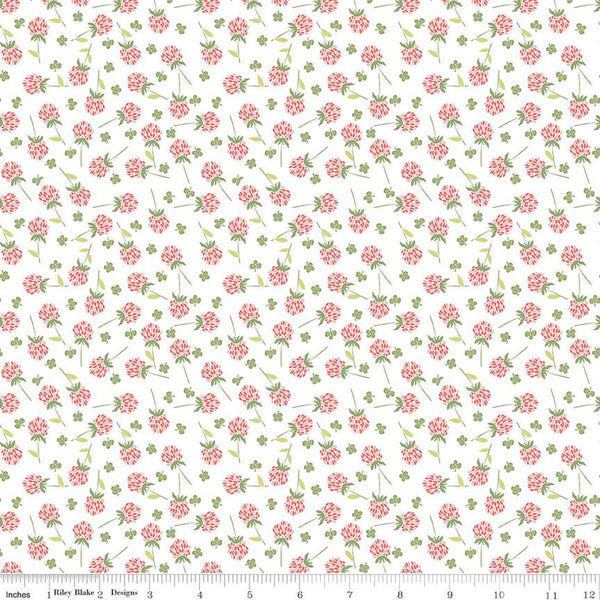 Clover Farm from Riley Blake Designs. Image depicts scattered pink clovers on a white background. Quilting cotton fabric. 
Cute Little Fabric Shop