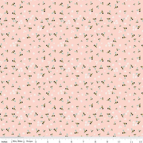 Clover Farm from Riley Blake Designs. Image depicts small bees and flowers scattered on a pink background. Quilting cotton fabric. 
Cute Little Fabric Shop