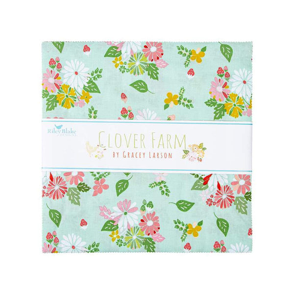 Image of 10 inch stacker from the Clover Farm by Riley Blake Designs. The main aqua fabric with flowers and strawberries is depicted. The fabric is quilting cotton fabric. 
Cute Little Fabric Shop