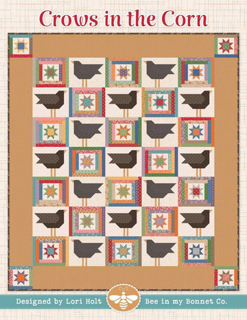 Image of the It's Sew Emma Crows in the Corn Quilt Pattern by Riley Blake Designs. The quilt has crows in squares with brown fabric surrounding it. 
Cute Little Fabric Shop