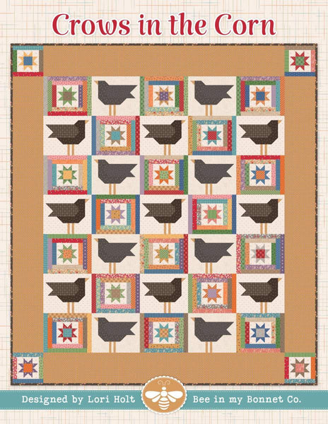 Image of the It&#39;s Sew Emma Crows in the Corn Quilt Pattern by Riley Blake Designs. The quilt has crows in squares with brown fabric surrounding it. 
Cute Little Fabric Shop