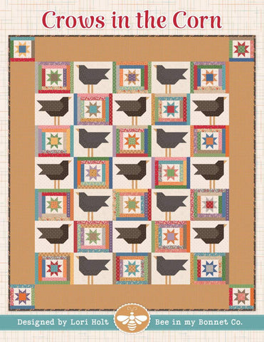 Image of the It&#39;s Sew Emma Crows in the Corn Quilt Pattern by Riley Blake Designs. The quilt has crows in squares with brown fabric surrounding it. 
Cute Little Fabric Shop