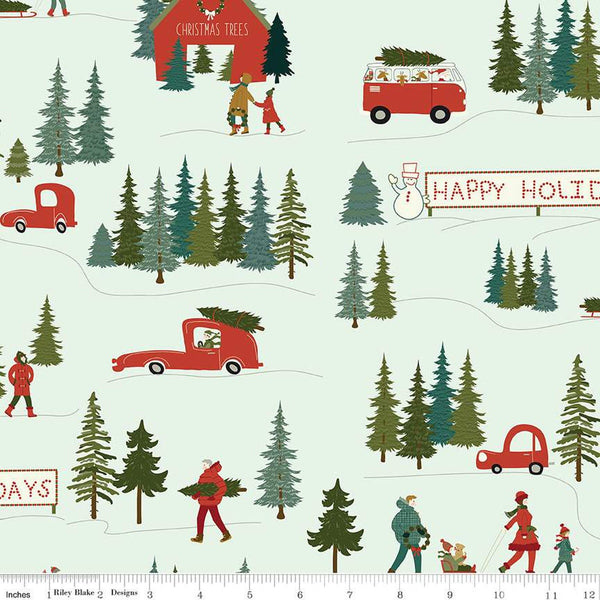 Image of Christmas Is in Town Main Mist by Riley Blake Designs. Features Christmas scenery with cars, people, and trees on a light mist background. 
Cute Little Fabric Shop