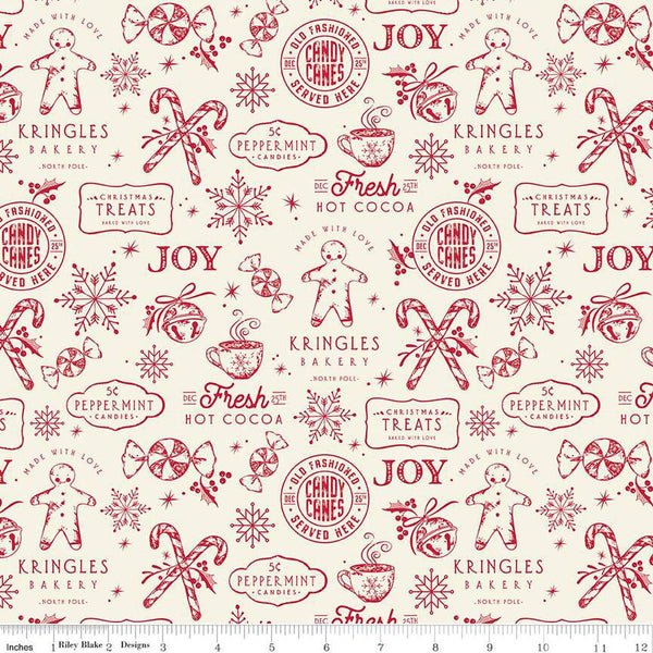 Cream quilting cotton fabric with red illustrations of gingerbread men, &quot;Christmas treats&quot; signs, candy canes peppermints, snowflakes, hot cocoa, and more. 
Cute Little Fabric Shop