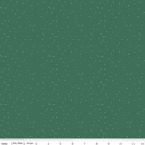 Green quilting cotton fabric with small white speckled dots. 
Cute Little Fabric Shop