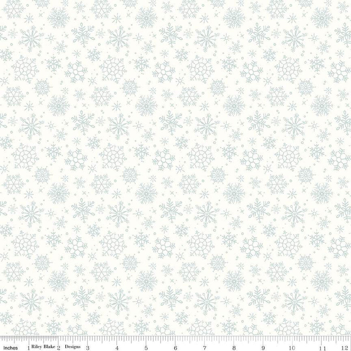 Image of the Magical Winterland Snowflake Snow quilting cotton fabric by Riley Blake Designs. Features scattered snowflakes on a white snow background. 
Cute Little Fabric Shop