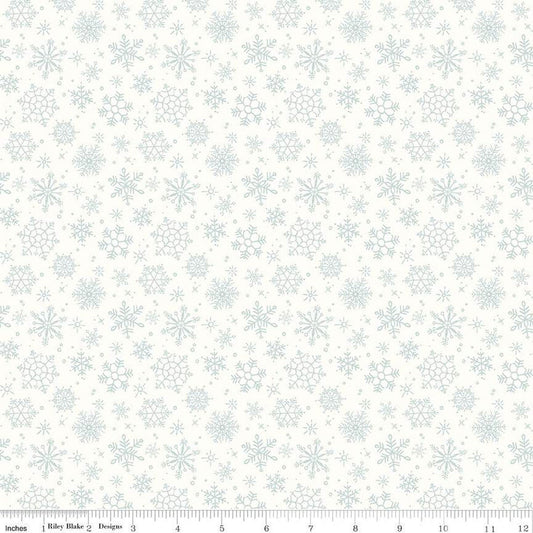 Image of the Magical Winterland Snowflake Snow quilting cotton fabric by Riley Blake Designs. Features scattered snowflakes on a white snow background. 
Cute Little Fabric Shop