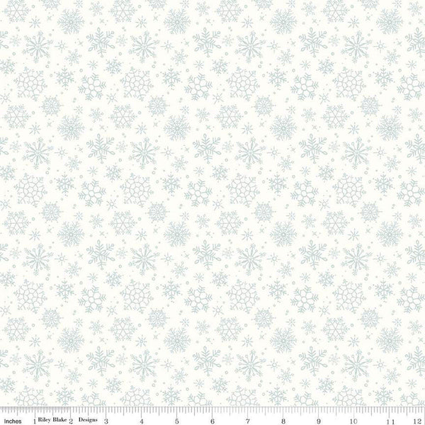 Image of the Magical Winterland Snowflake Snow quilting cotton fabric by Riley Blake Designs. Features scattered snowflakes on a white snow background. 
Cute Little Fabric Shop