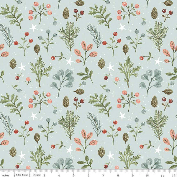 Image of the Magical Winterland Foliage Blue quilting cotton fabric by Riley Blake Designs. Features a quilt design with leaves, berries, sprigs, and stars on a 
blue background. 
Cute Little Fabric Shop