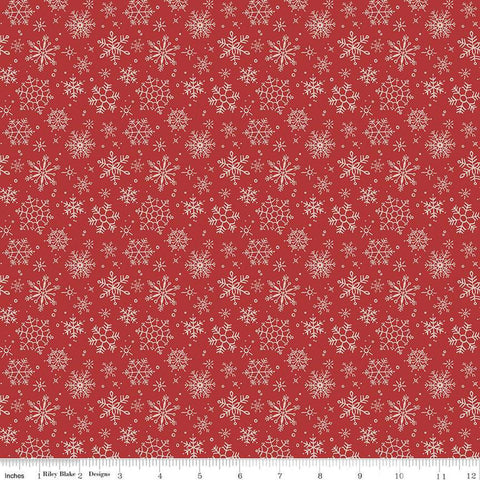 Image of the Magical Winterland Snowflake Barn Red quilting cotton fabric by Riley Blake Designs. Features scattered snowflakes on a dark red background. 
Cute Little Fabric Shop