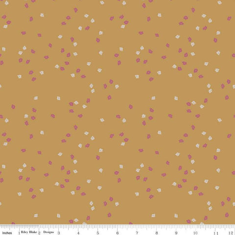 Dark yellow, honey colored quilting cotton fabric with pink and white scattered flowers. 
Cute Little Fabric Shop