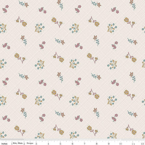 Cream, linen colored fabric with light grid lines on the background and scattered yellow, teal, and pink flowers. 
Cute Little Fabric Shop