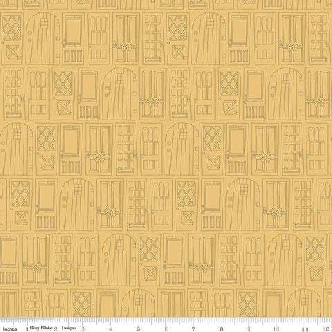 Light yellow, honey colored fabric with outlined front doors together in rows. 
Cute Little Fabric Shop