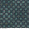 Navy, ink, night colored quilting cotton fabric with circular floral wreathes that are light teal, yellow, and white. 
Cute Little Fabric Shop