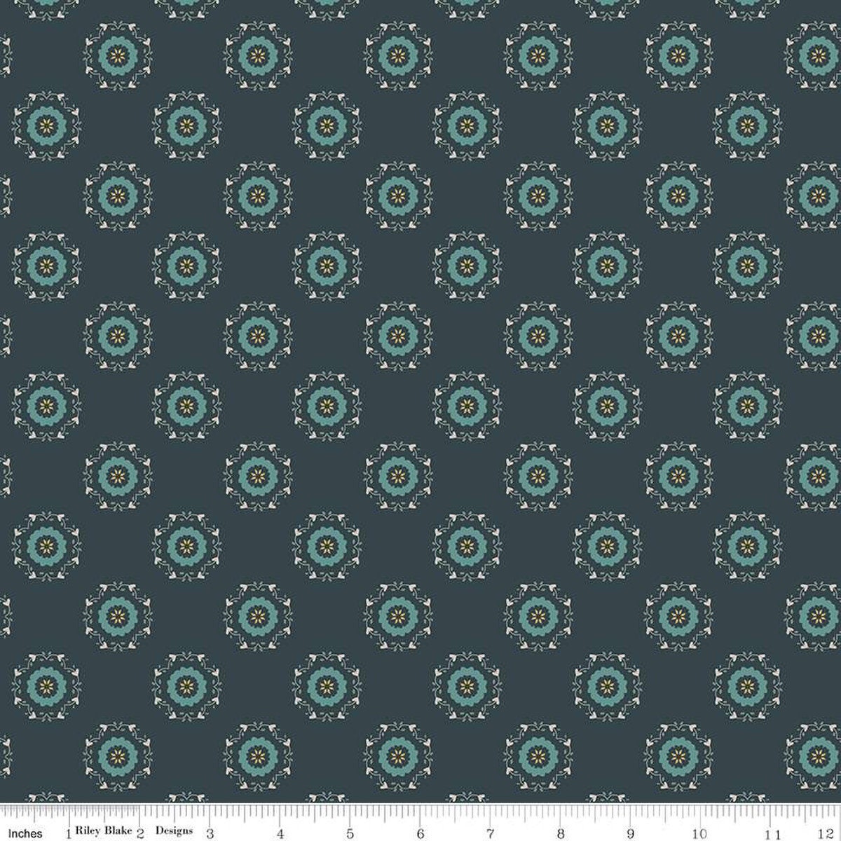 Navy, ink, night colored quilting cotton fabric with circular floral wreathes that are light teal, yellow, and white. 
Cute Little Fabric Shop