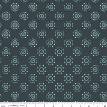 Navy, ink, night colored quilting cotton fabric with circular floral wreathes that are light teal, yellow, and white. 
Cute Little Fabric Shop