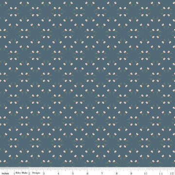 Blue, navy, ink colored quilting cotton fabric with clusters of scattered white tulips. 
Cute Little Fabric Shop