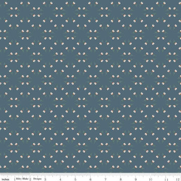 Blue, navy, ink colored quilting cotton fabric with clusters of scattered white tulips. 
Cute Little Fabric Shop