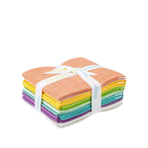 Picture of Riley Blake&#39;s spring colored fat quarter bundle from the texture collection. Includes bright purples, blues, yellows, greens, and more. Bundle is tied with a ribbon. 
Cute Little Fabric Shop