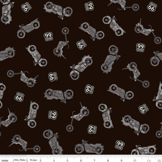 Black colored quilting cotton fabric with yellow and gray colored motorcycles, with Route 66 signs. 
Cute Little Fabric Shop