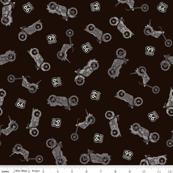 Black colored quilting cotton fabric with yellow and gray colored motorcycles, with Route 66 signs. 
Cute Little Fabric Shop