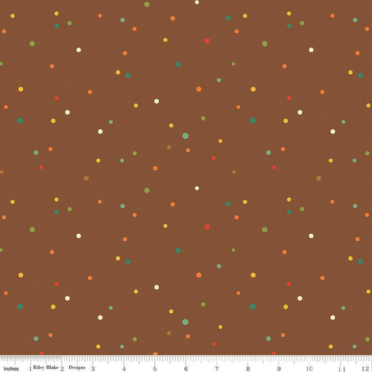 Image of the Autumn Afternoon Hexi Dots Brown quilting cotton fabric by Heather Peterson for Riley Blake Designs. Features multicolored hexagon polka dots on a medium brown background. 
Cute Little Fabric Shop