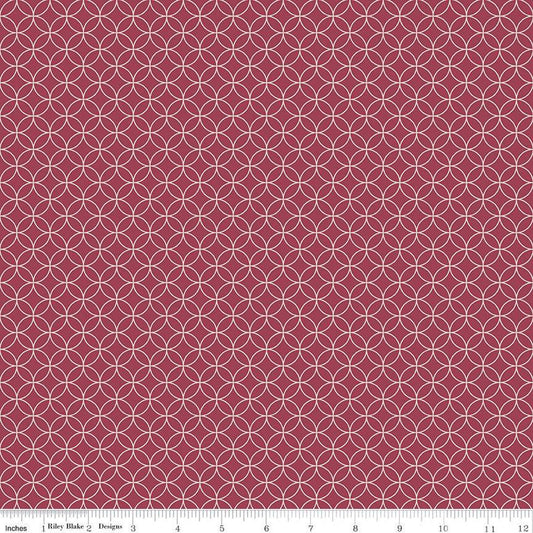 Image of the Autumn Afternoon Pumpkin Seeds Berry quilting cotton fabric by Heather Peterson for Riley Blake Designs. Features an orange peel geometric design on a dark pink purple wine colored background. 
Cute Little Fabric Shop