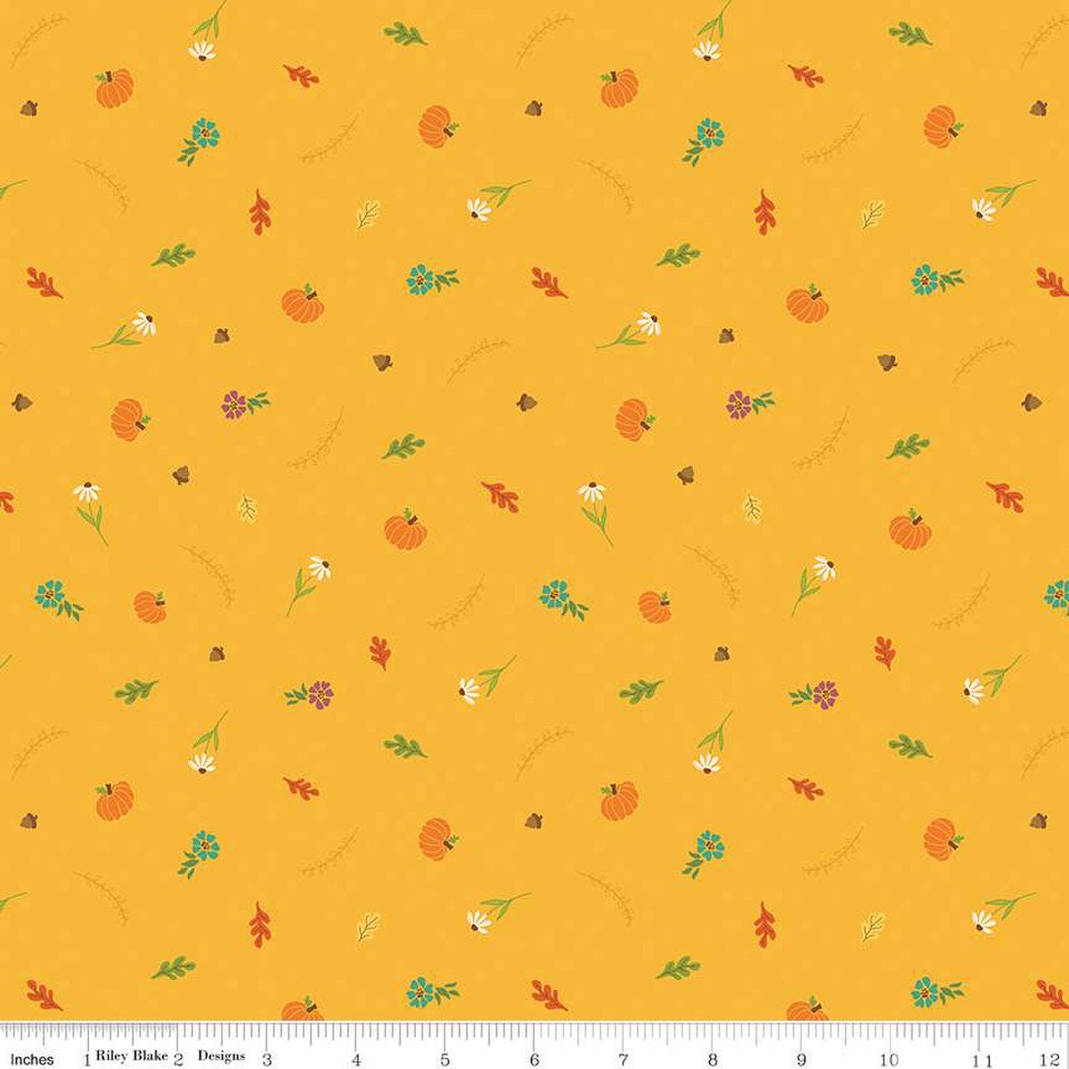 Image of the Autumn Afternoon Fall Toss Saffron quilting cotton fabric by Heather Peterson for Riley Blake Designs. Features scattered flowers, pumpkins, and acorns on a yellow background. 
Cute Little Fabric Shop