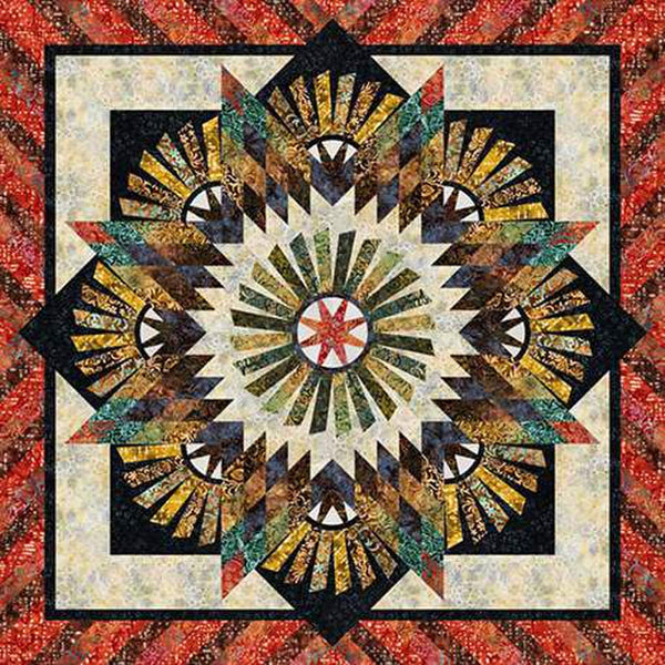 Image of the Quiltworx Tarnished Windmill Quilt Pattern by Bradley and Judy Niemeyer for Riley Blake Designs. The quilt has stripes in a star pattern, with yellows, oranges, and golds. 
Cute Little Fabric Shop