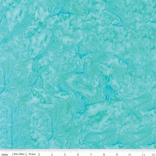 Image of the Expressions Batiks Hand-Dyes Aquamarine quilting cotton fabric by Riley Blake Designs. Features a light blue aqua fabric on a varied swirled design. 
Cute Little Fabric Shop