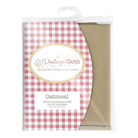 Image of the Lori Holt Vintage Cloth Oatmeal vintage everweave clock. Features a tan colored cloth in a package. 
Cute Little Fabric Shop