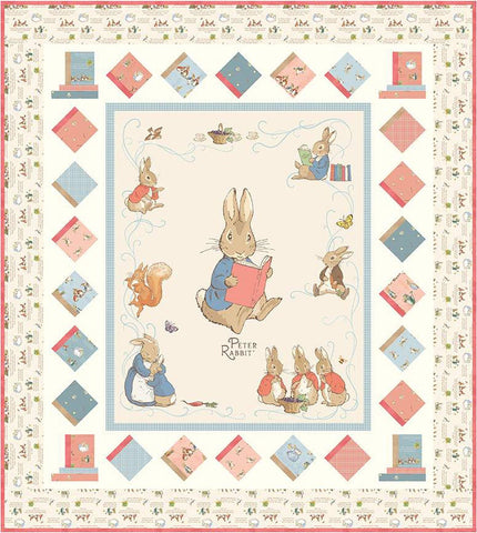 Image of the Book Adventures Quilt Boxed Kit by Riley Blake Designs. 
Features a quilt with Peter Rabbit and books on the border with a cream background. 
Cute Little Fabric Shop